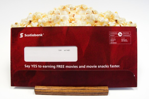 Scotiabank mailing, die-cut wndow envelope, popcorn on top